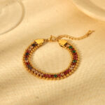 This is a popular light luxury bracelet made of stainless steel with 18K gold beads and color diamonds. It is a three-layer versatile bracelet that is waterproof