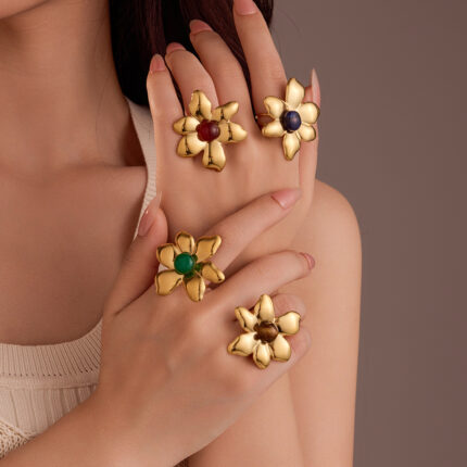 An InS-style versatile and trendy stainless steel ring with 18K gold plating, irregular petal colors, and natural stone titanium steel with an open opening