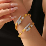 Hot-selling personalized inS-style jewelry: A snake-shaped, hollowed-out and diamond-encrusted titanium steel gold-plated bracelet - Image 2